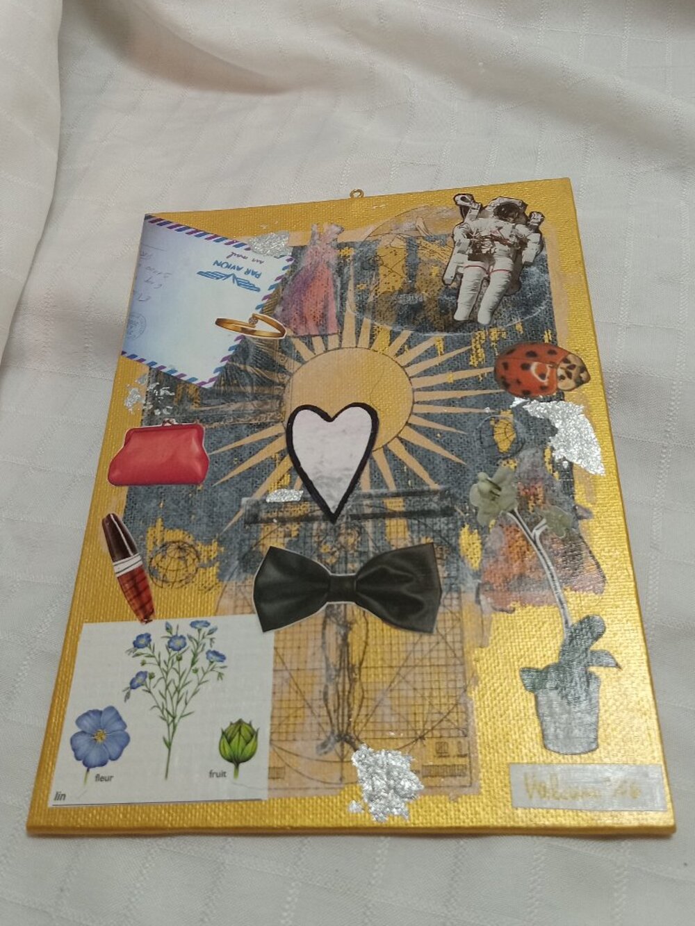 Prints of old magazines on canvas, gold paint, and mixed-media collages